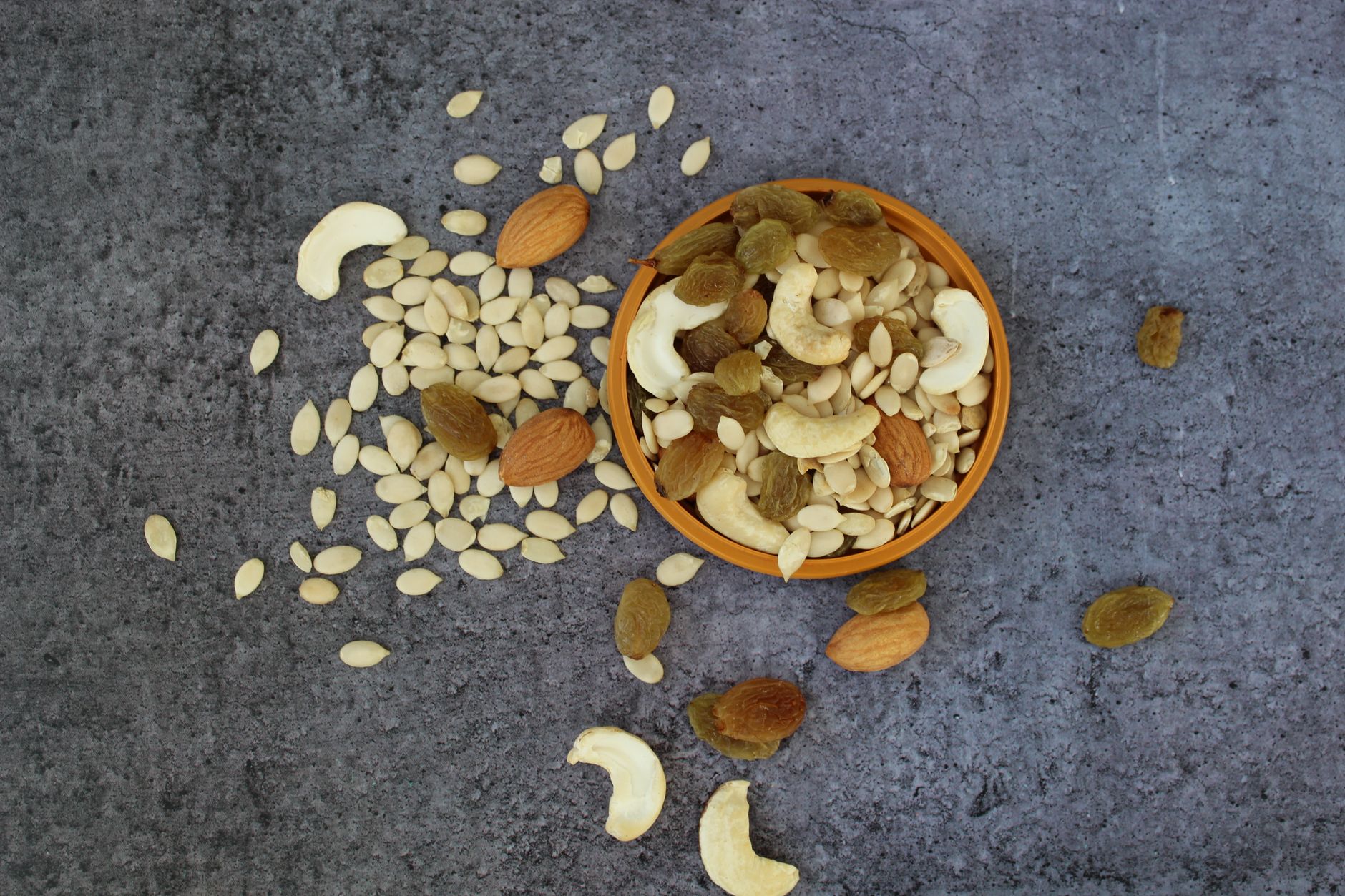 Assorted seeds, grains, and nuts rich in essential fatty acids