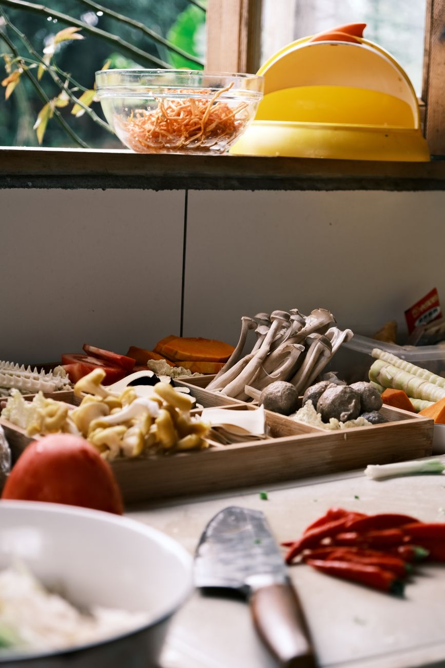 Fresh organic culinary ingredients and nutritious vegetables prepared on a clean table